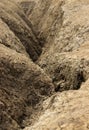 Very cracked volcanic soil, dry, with valleys, in the area of Ã¢â¬â¹Ã¢â¬â¹muddy volcanoes in Buzau, Romania Royalty Free Stock Photo